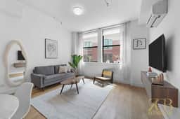 Modern 1BR in Prime Manhattan w/Laundry & Elevator - Image 3