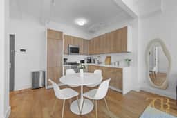 Modern 1BR in Prime Manhattan w/Laundry & Elevator - Image 5