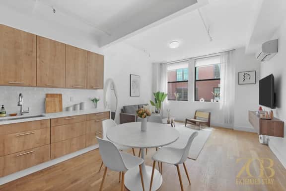 Modern 1BR in Prime Manhattan w/Laundry & Elevator - Image 4