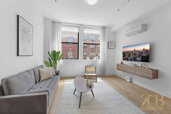 Modern 1BR in Prime Manhattan w/Laundry & Elevator