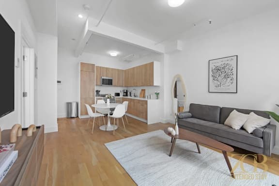 Modern 1BR in Prime Manhattan w/Laundry & Elevator - Image 1